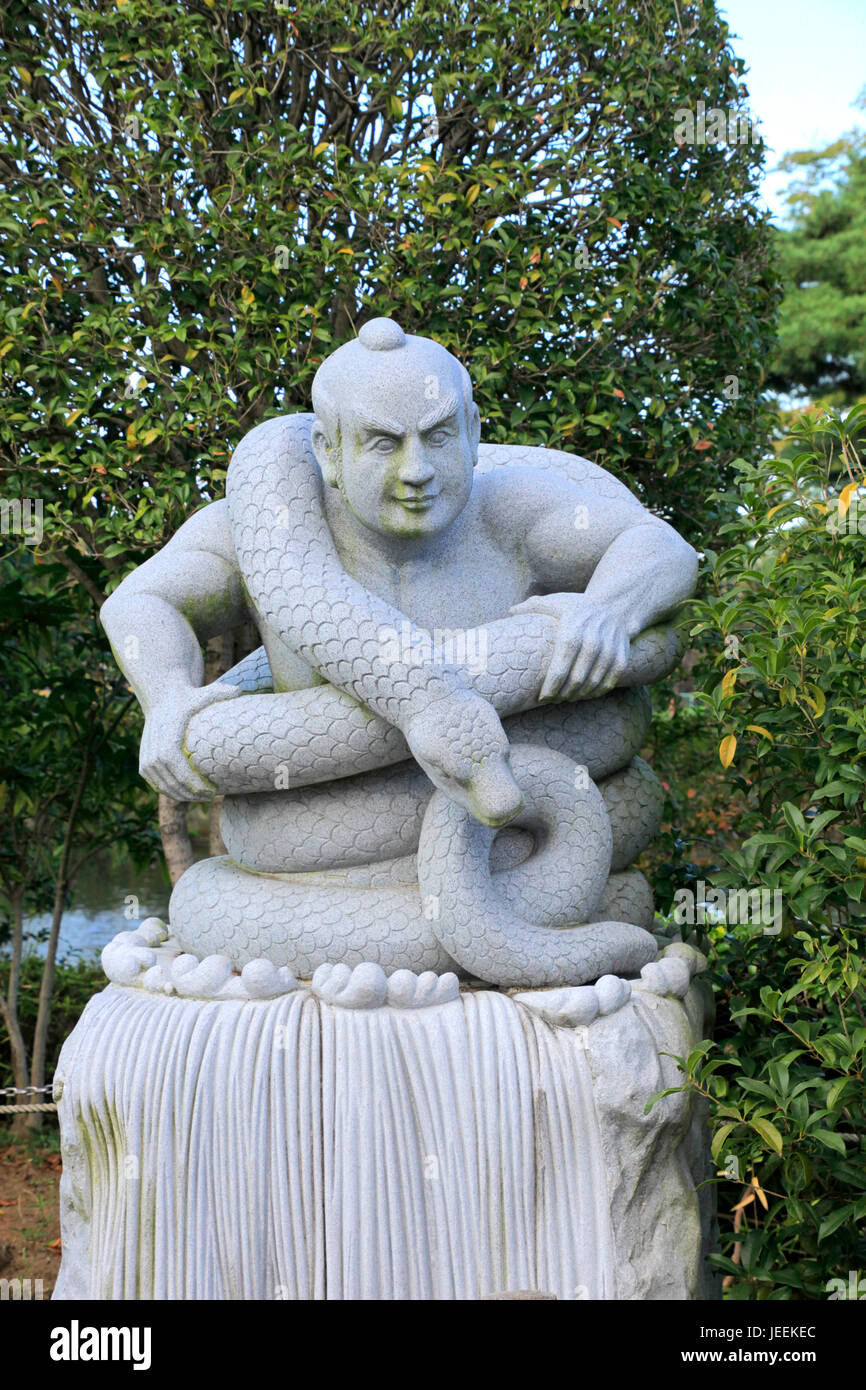 The Statue of Snake Eating Jiemon at Sayama-Ike Koen Park in Mizuho-machi  Nishitama District Tokyo Japan Stock Photo - Alamy