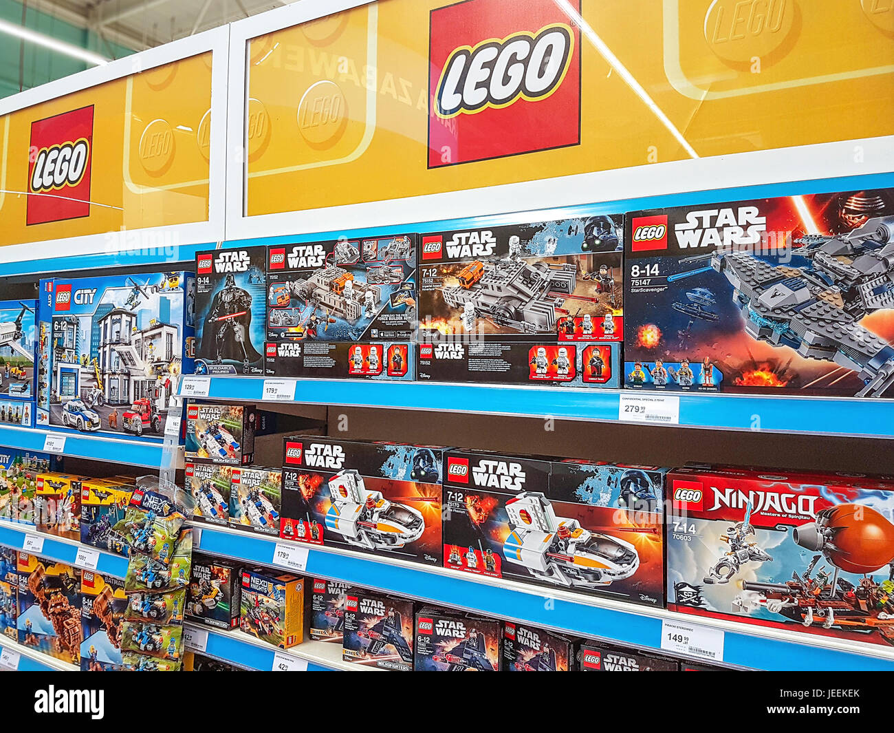 Nowy Sacz, Poland - June 16, 2017:  Lego construction kits for sale in the Tesco supermarket. Lego is a line of plastic construction toys that are man Stock Photo