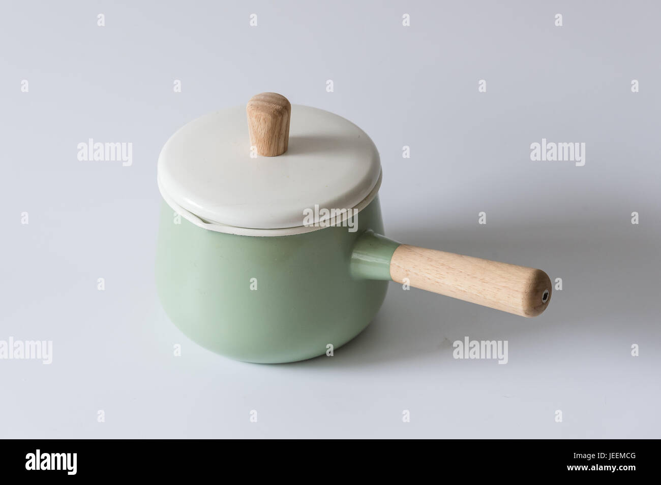 https://c8.alamy.com/comp/JEEMCG/the-green-enameled-pots-indoors-JEEMCG.jpg