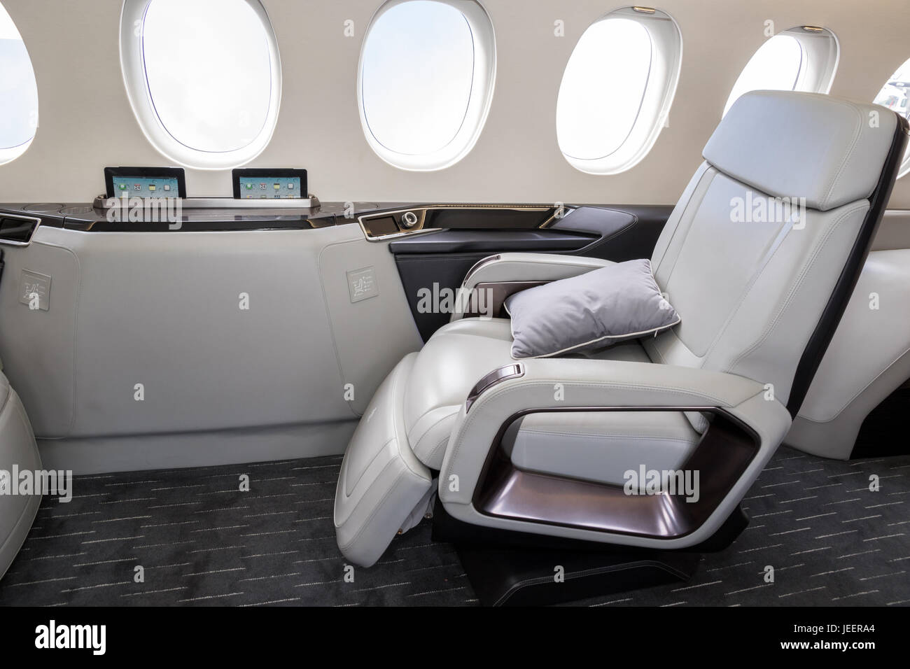 PARIS, FRANCE - JUN 23, 2017: Modern interior of the long-range business jet Dassault Falcon 5X at the Paris Air Show 2017. Stock Photo