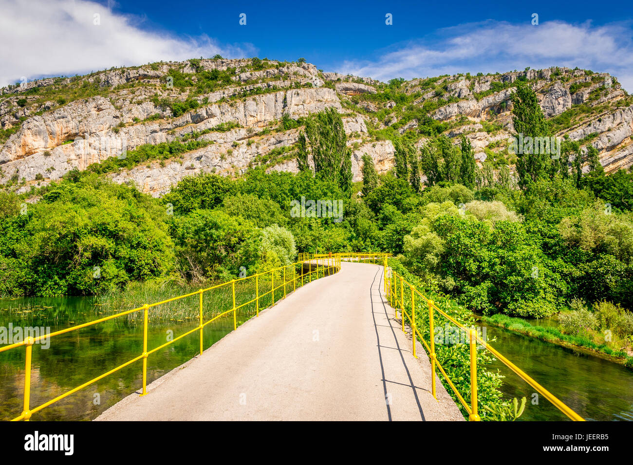 Bridge over the Krka River near Roski Slap in the Krka National Park, Croatia. Stock Photo