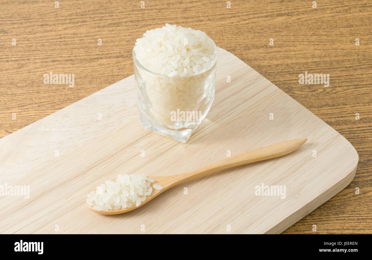 Japanese Cuisine, Raw and Uncooked Japanese Rice in Wooden Spoon and ...