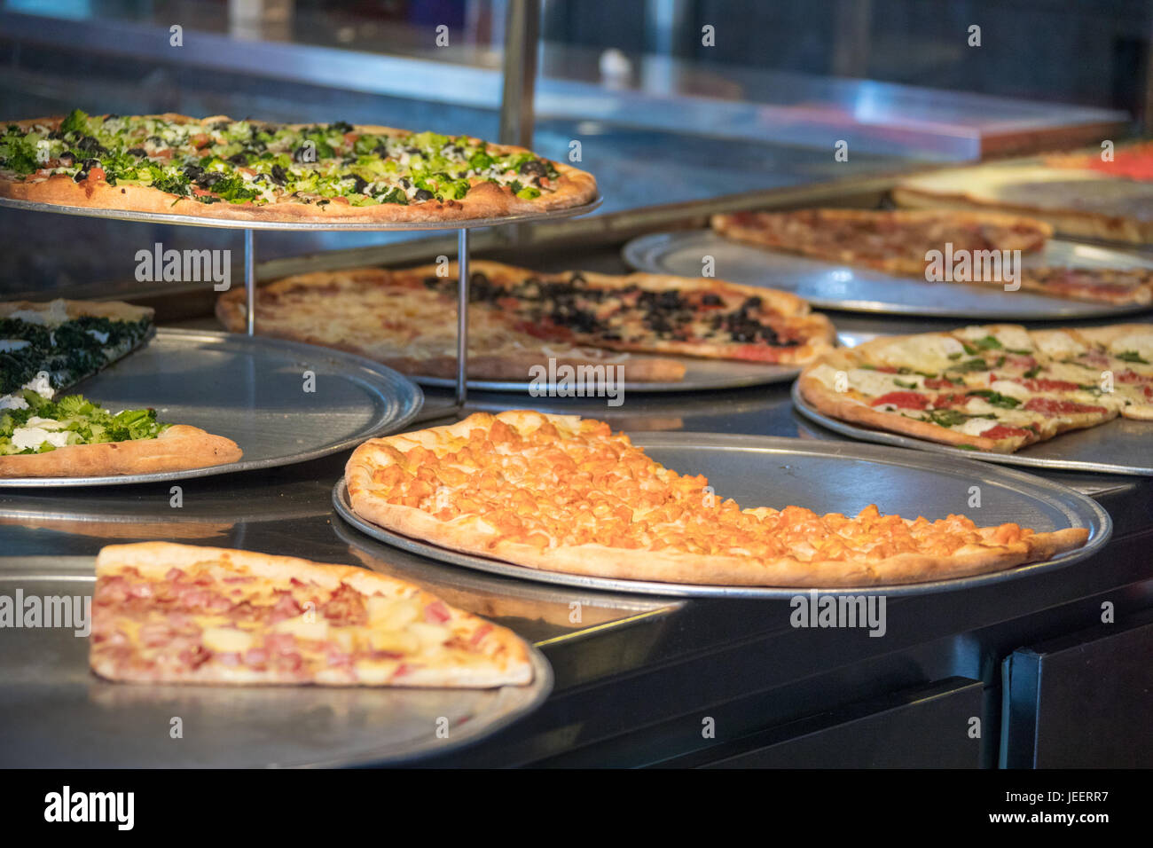 Pizza by the slice, Stromboli Pizza, East Village, Manhattan, New York Stock Photo