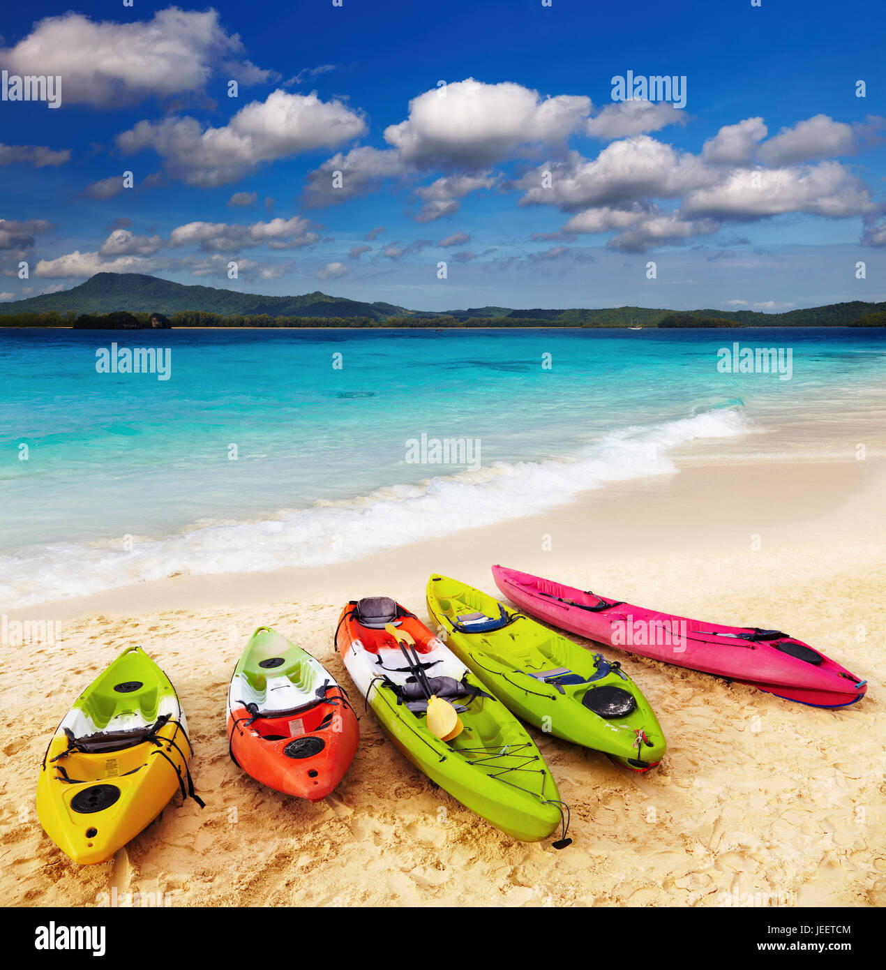 Colorful kayaks on the tropical beach Stock Photo