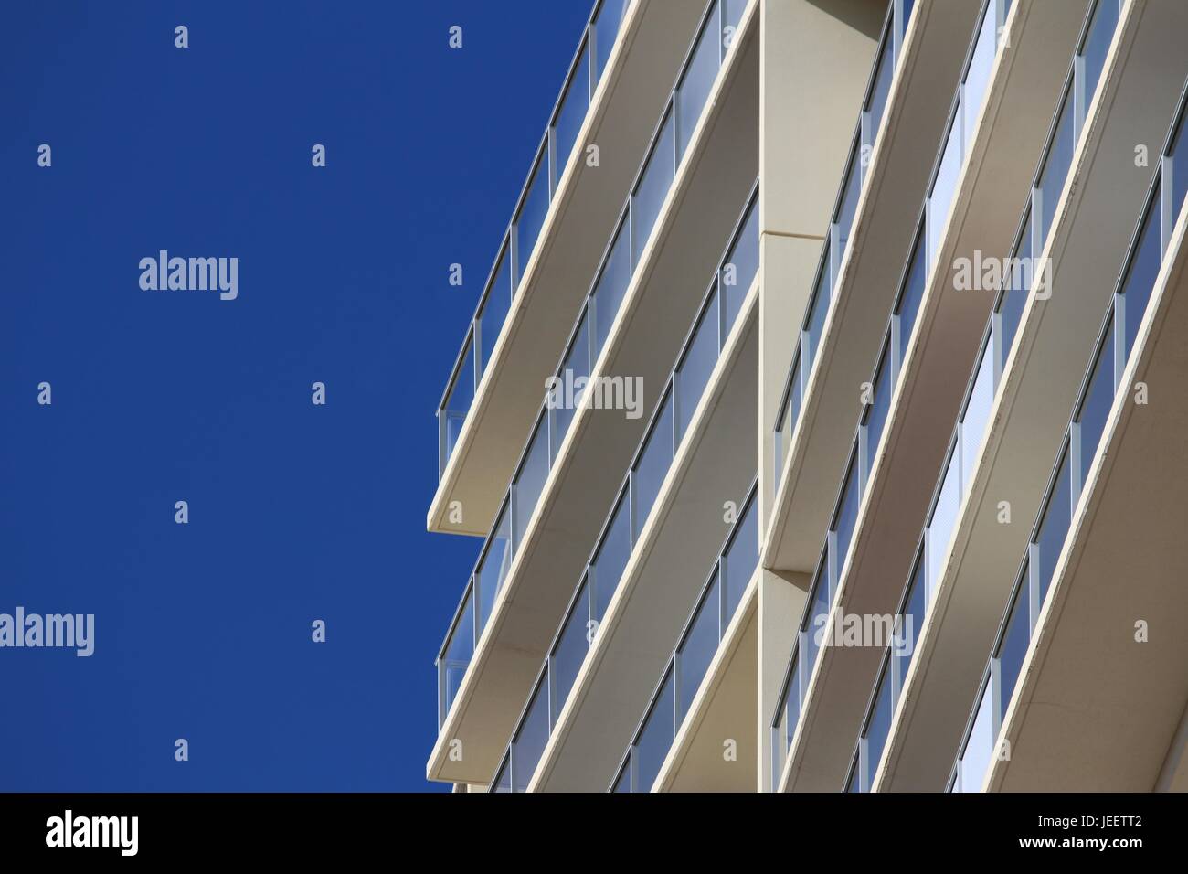 Building against blue sky Stock Photo - Alamy