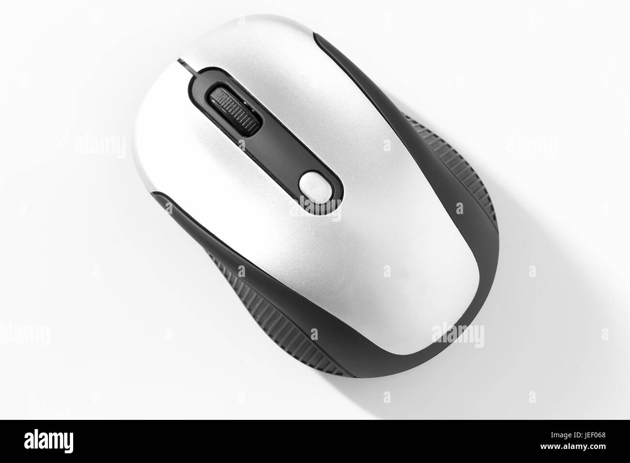 The classic computer mouse close up on a white background. Stock Photo