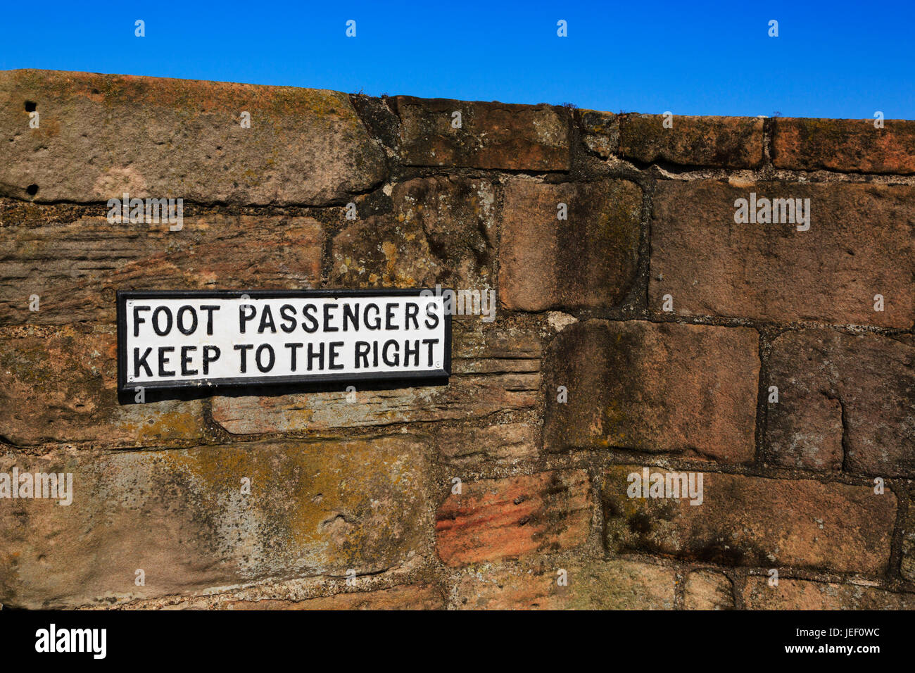 Sign warning foot passengers to keep to the right on Berwick's Old Bridge. Berwick upon Tweed. Englands most northerly town. Stock Photo