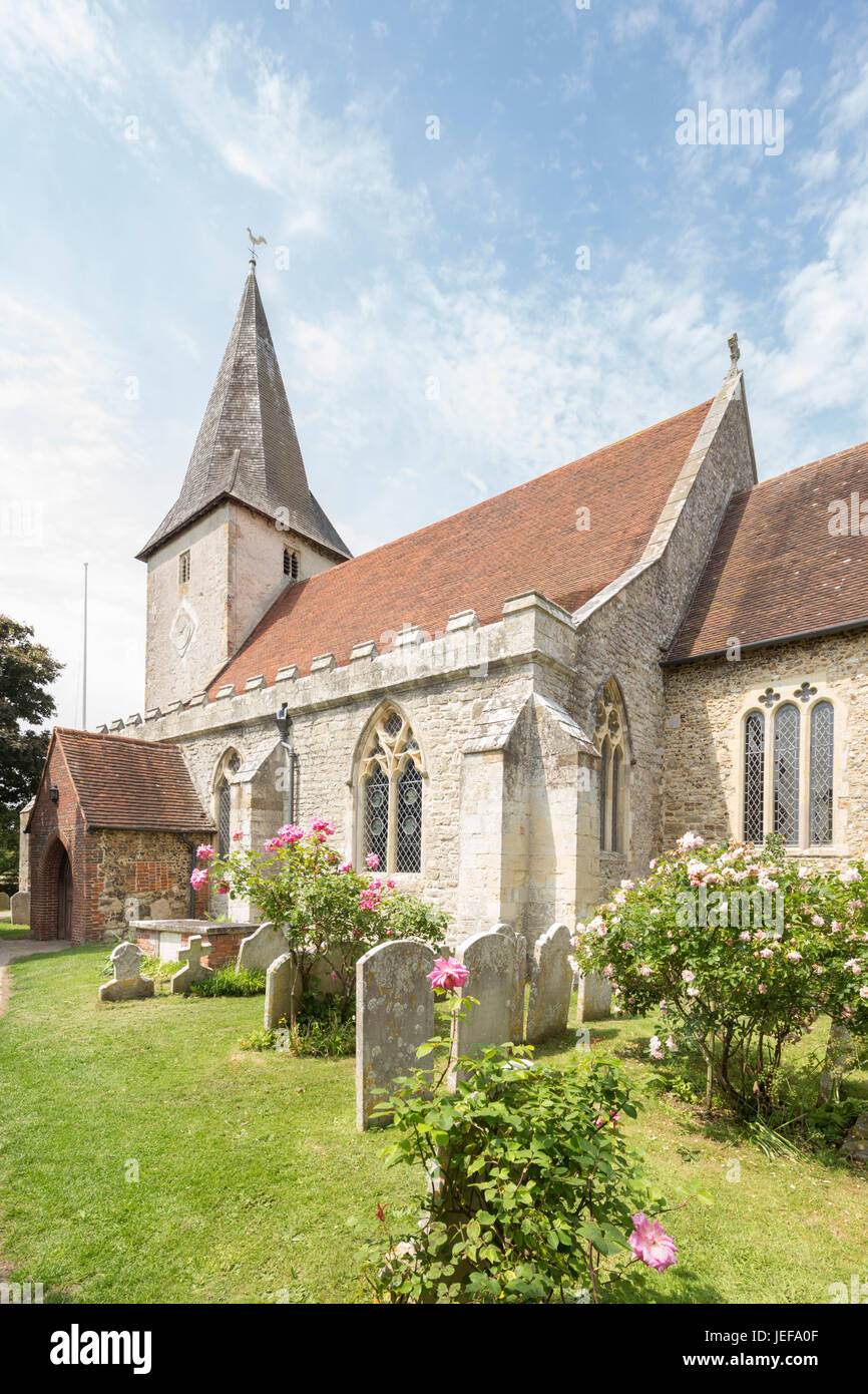 The Holy Trinity Church in the attractive coastal village of Bosham, West Sussex, England, UK Stock Photo