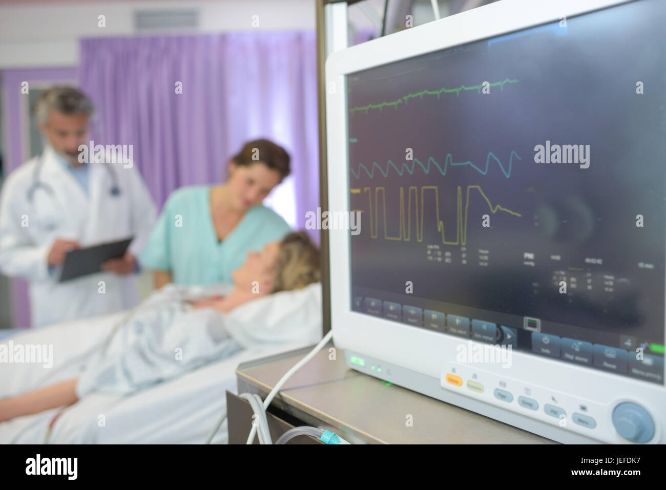 electrocardiograph monitor in hospital Stock Photo