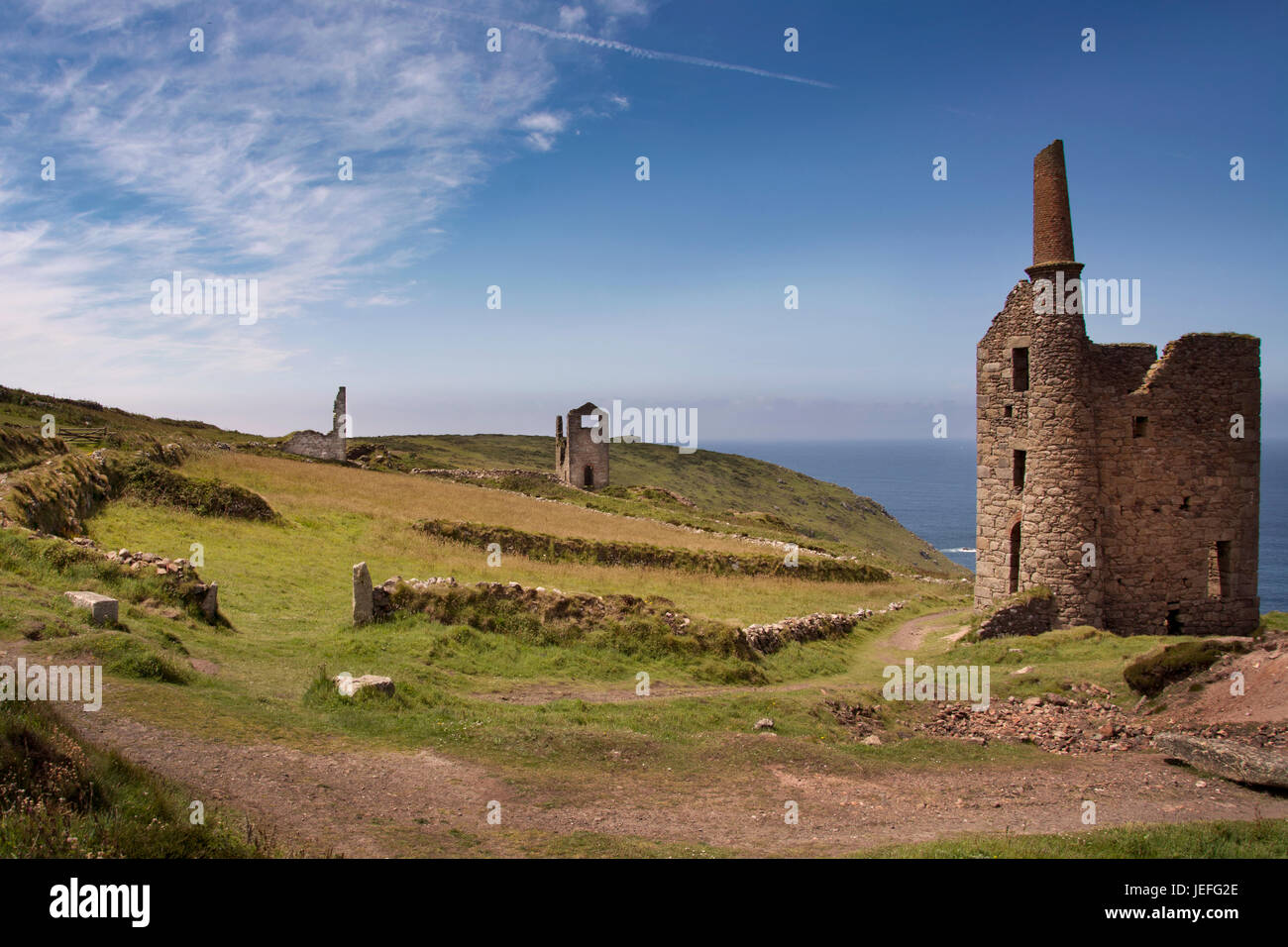 Tin mines and engine houses on the coast of Cornwall near St Just Stock