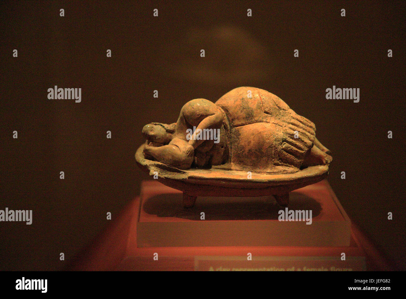 Sleeping Lady carved stone figure from Hal  Saflieni Hypogeum , National Museum of Archaeology, Valletta, Malta Stock Photo