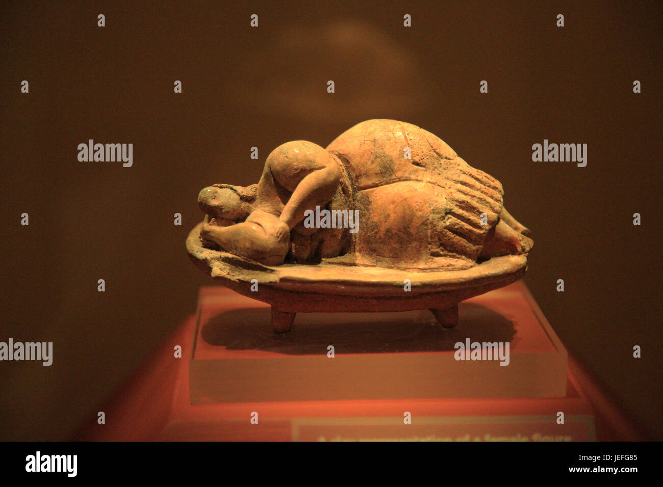 Sleeping Lady carved stone figure from Hal  Saflieni Hypogeum , National Museum of Archaeology, Valletta, Malta Stock Photo