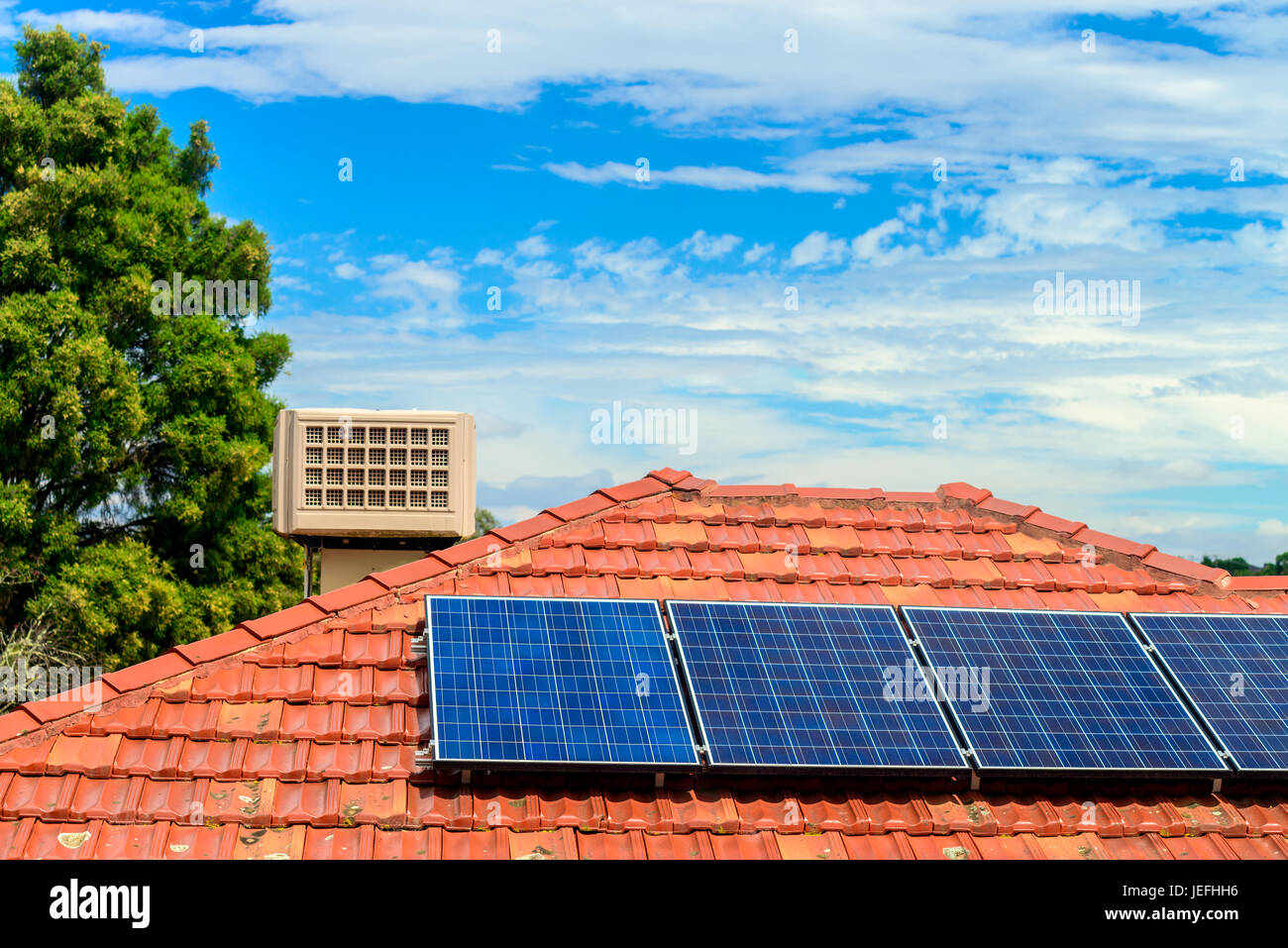 Solar panels installed on the house roof in one of the Melbourne suburbs, Victoria, Australia Stock Photo
