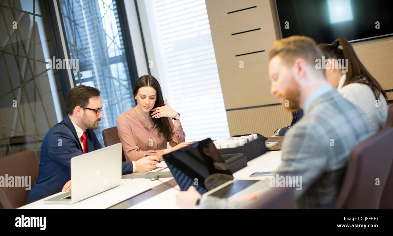 Group of young people working in the office Stock Photo - Alamy