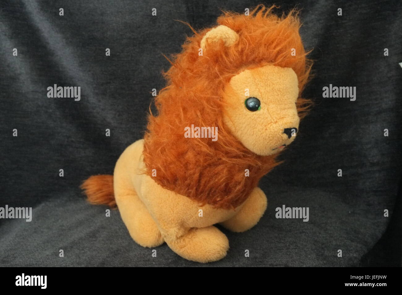 vintage lion plush orange cute and sweet Stock Photo - Alamy