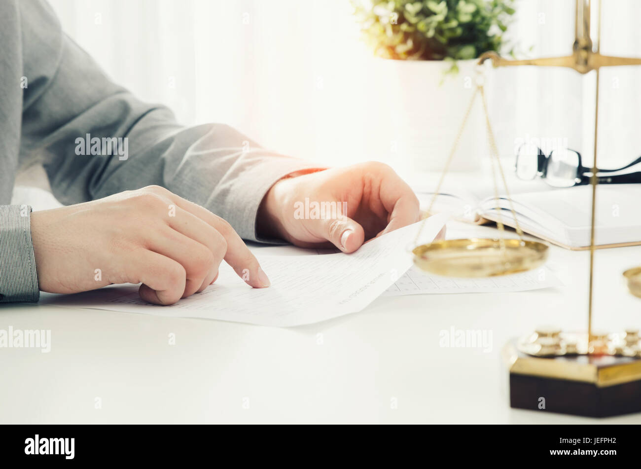 Lawyer working in the office. lawyer law attorney scales office justice person concept Stock Photo