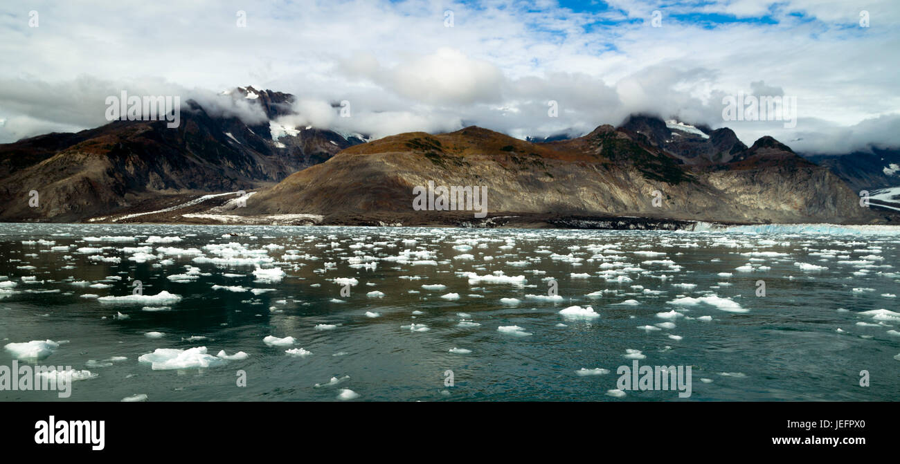 The Aialik Glacier flows in to a bay of the same name drains the Harding Ice Field Stock Photo