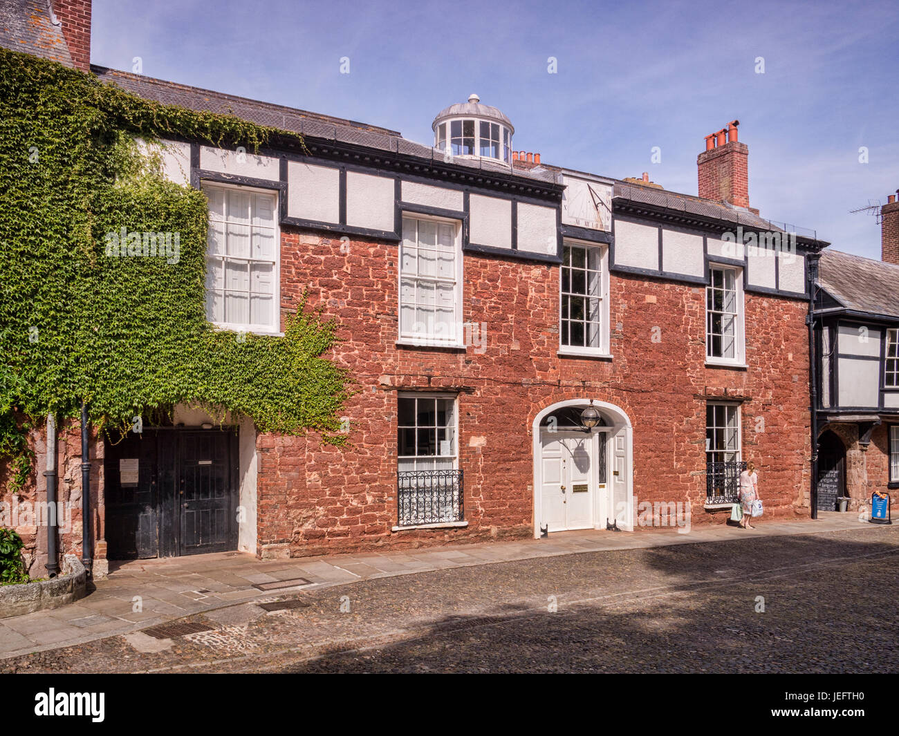 20 June 2017: Exeter, Devon, UK - Houses in Cathedral Close, Exeter, across the Green from the Cathedral. Stock Photo