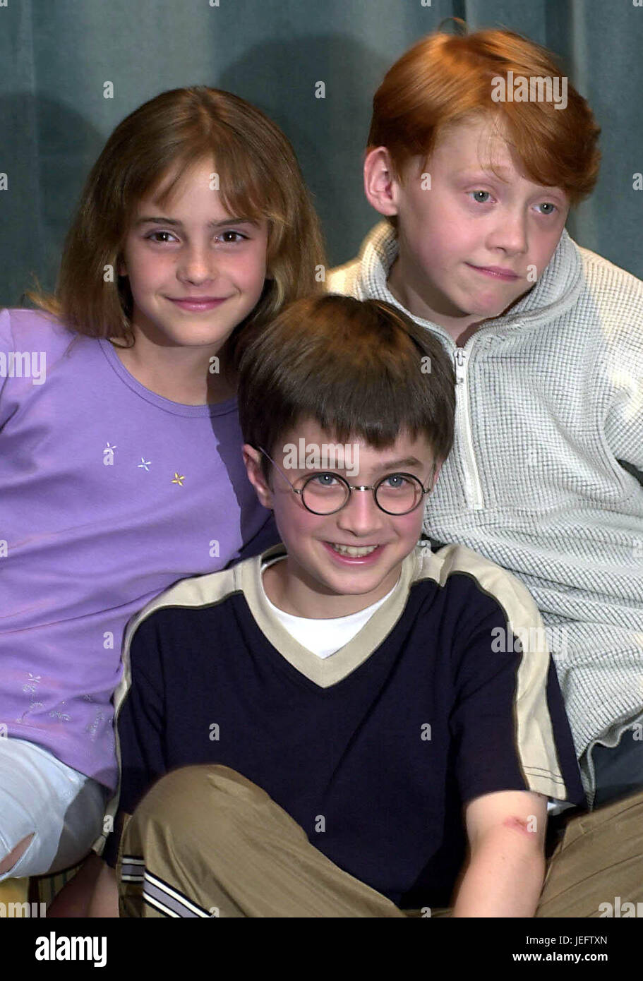 Embargoed to 0001 Monday June 26 File photo dated 23/08/00 of Harry Potter actors (left to right) Emma Watson (Hermione Granger), Daniel Radcliffe (Harry Potter) and Rupert Grint (Ron Weasley), as Harry Potter fans around the world will today celebrate the 20th anniversary of the first book about The Boy Who Lived. Stock Photo