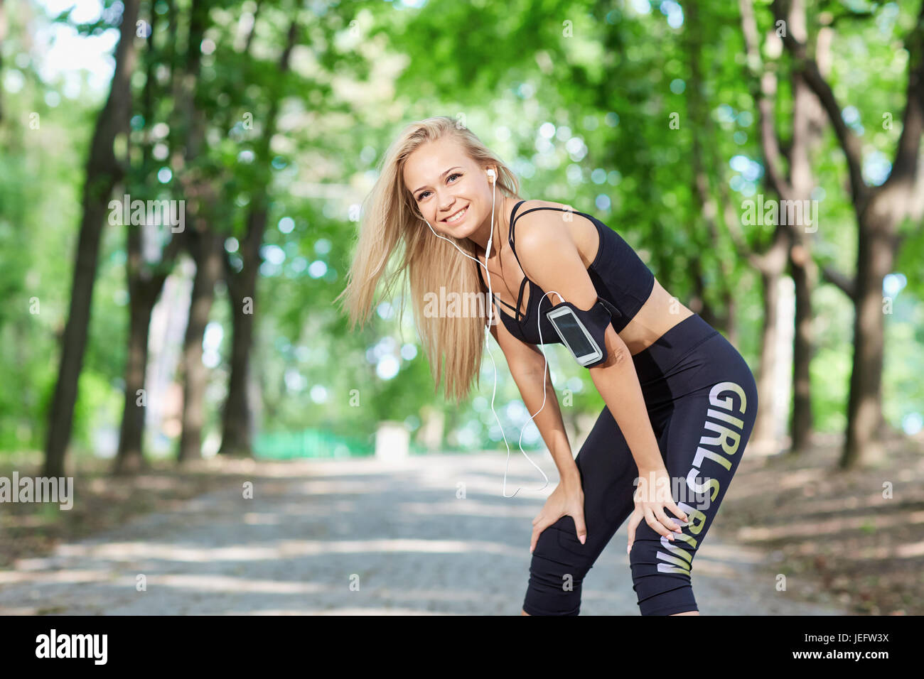 Active woman park hi-res stock photography and images - Alamy