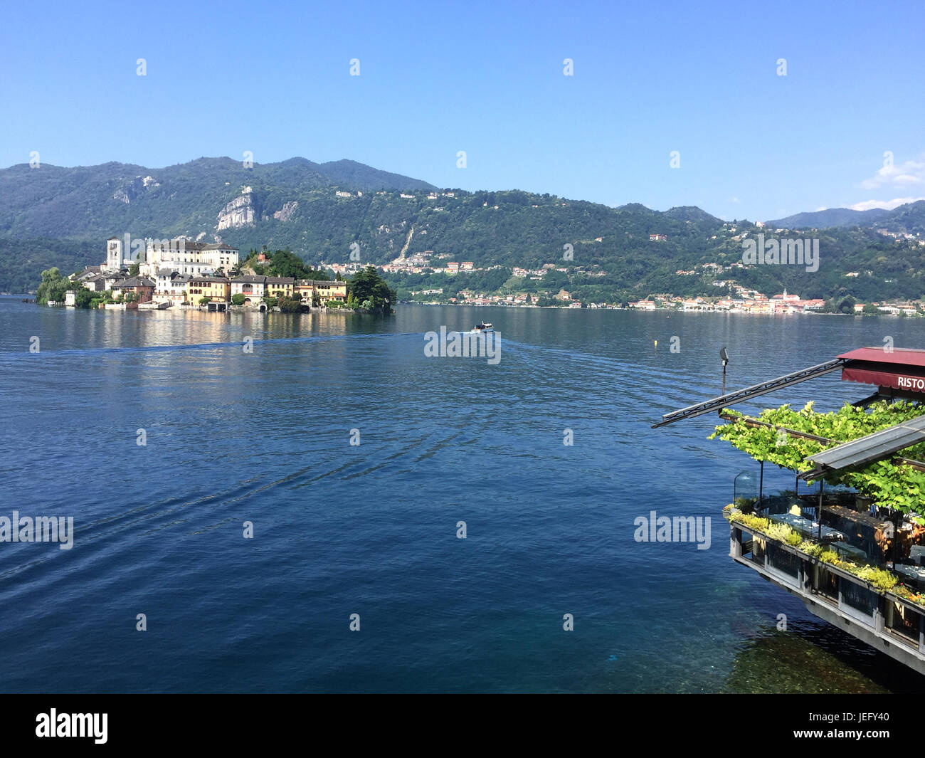 LAKE ORTA, Piedmont, Italy, looking towards Isola San Giulio from Pella village. Photo: Tony Gale Stock Photo