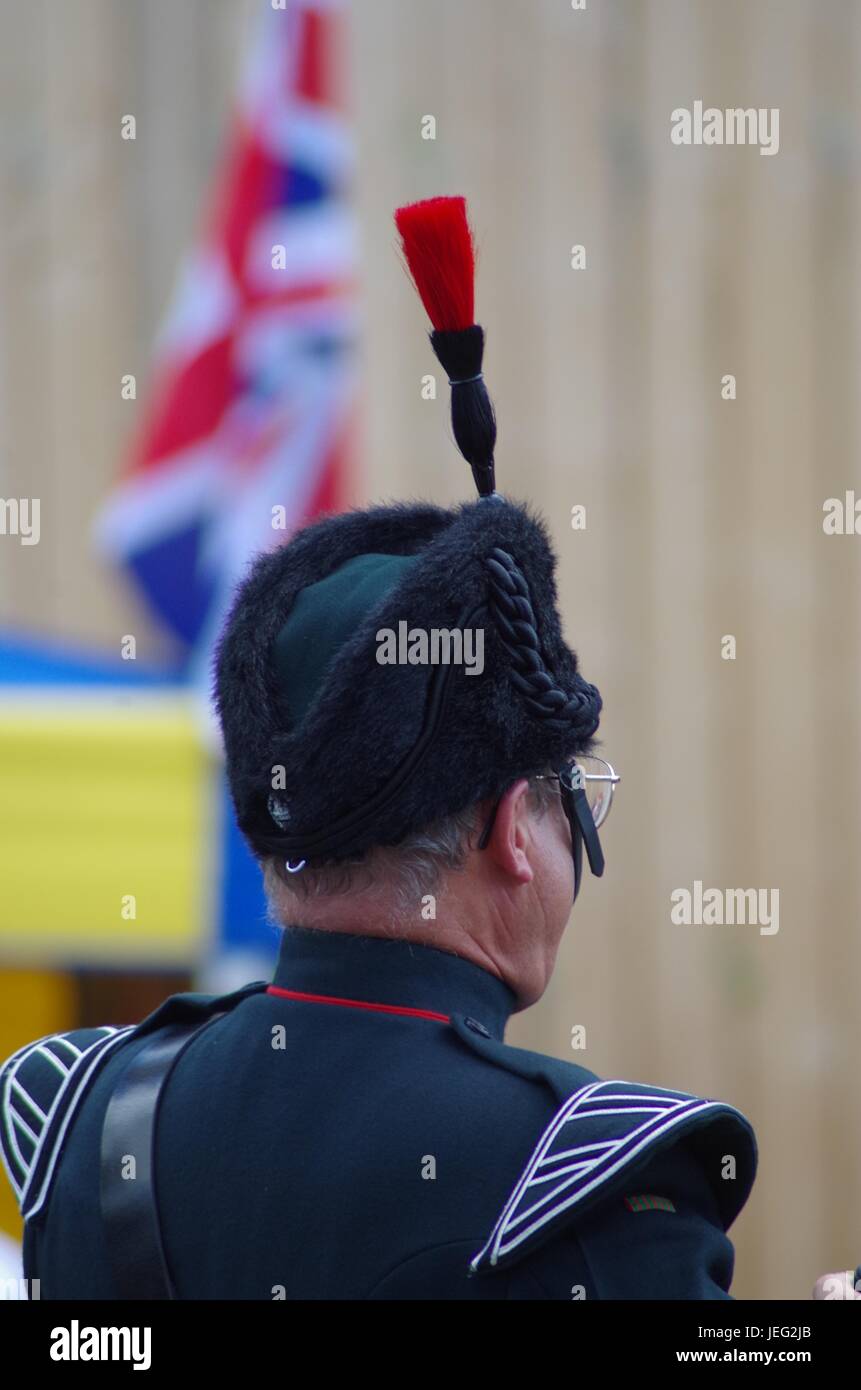 The Rifles Army Bugler and Union Jack Flag. Exeter Cathedral green ...