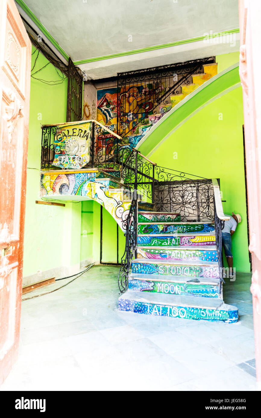 Colourful steps, colourful stairs, colorful steps, colorful stairs, tattoo parlour, staircase, steps, stairs, risers, painted staircase, painted steps Stock Photo