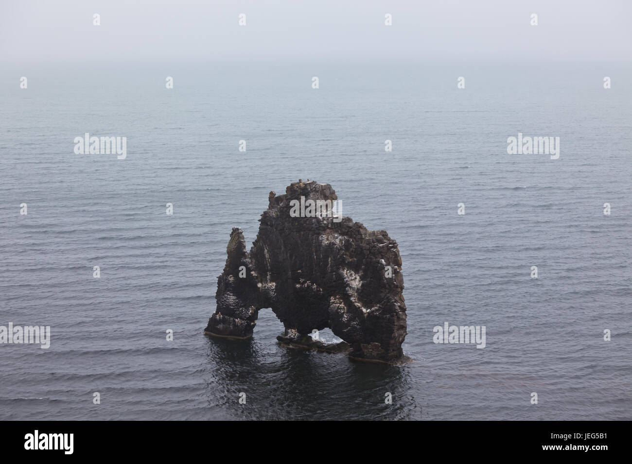 Hvitserkur is a spectacular rock in the sea on the Northern coast of Iceland. Bad weather Stock Photo