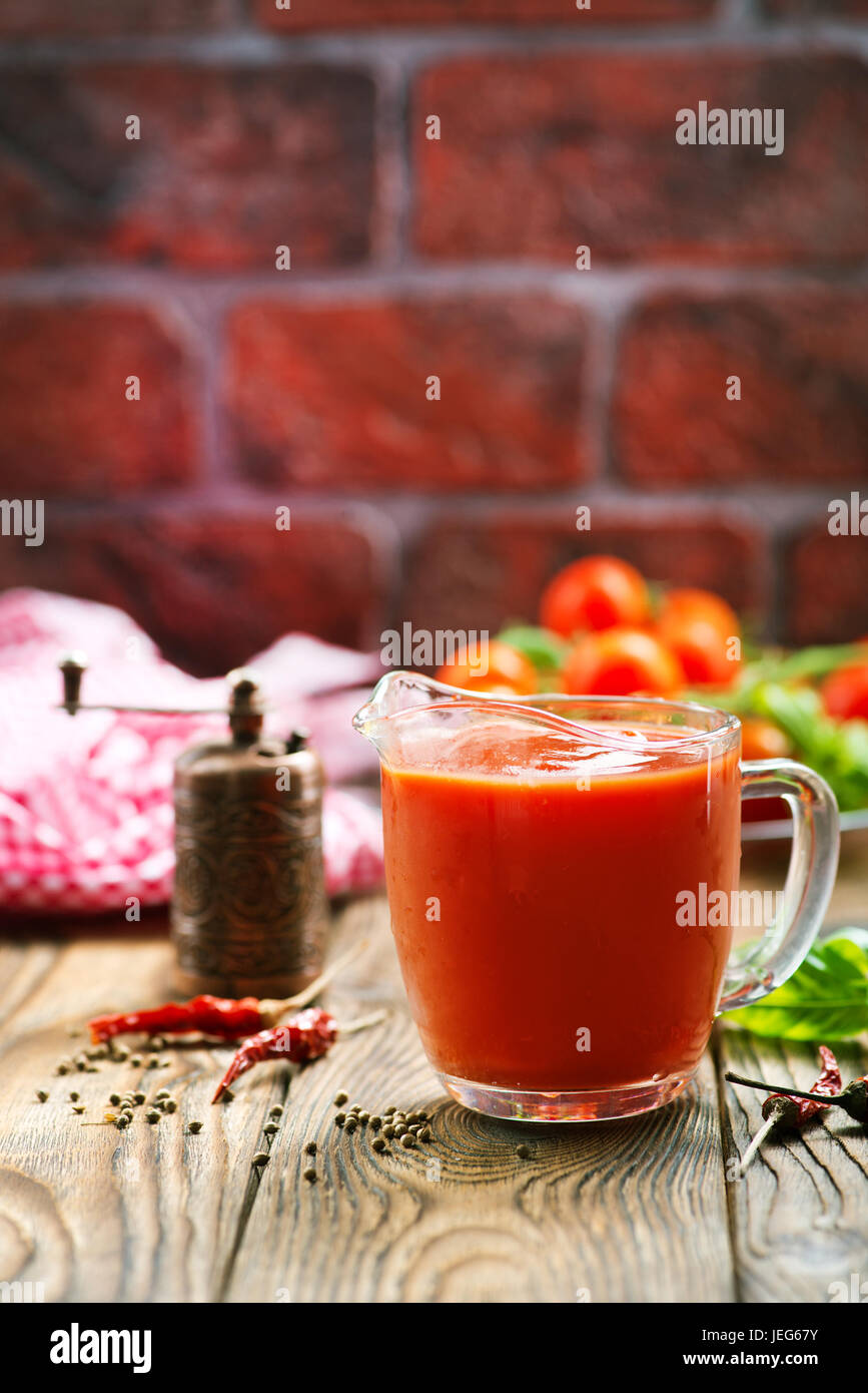 tomato sauce in glass jug and on a table Stock Photo - Alamy