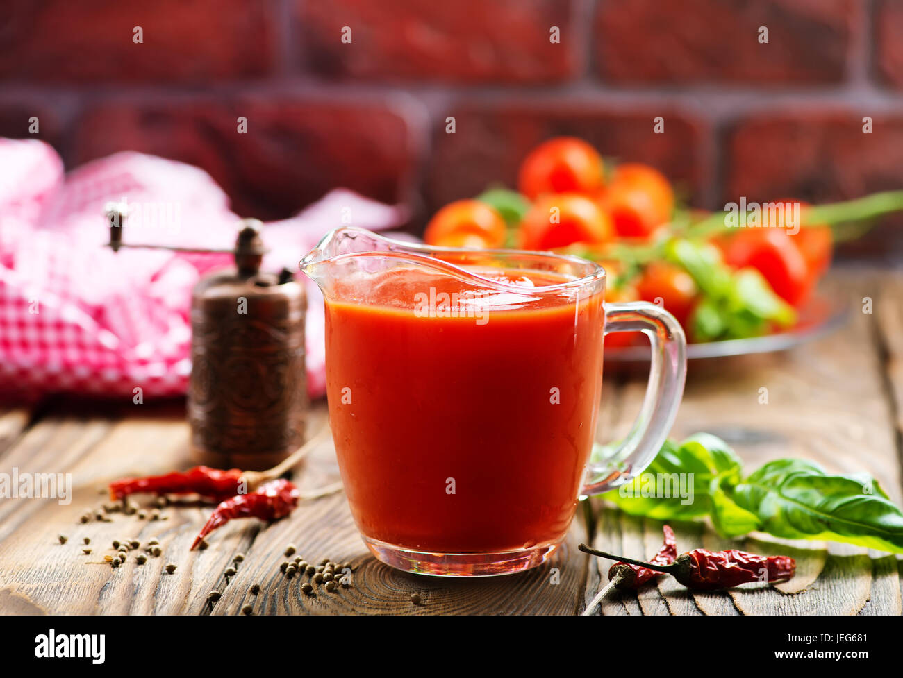tomato sauce in glass jug and on a table Stock Photo - Alamy