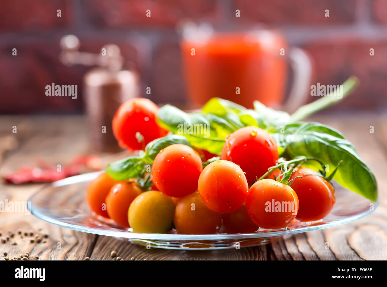 fresh tomato and basil on the wooden table Stock Photo - Alamy