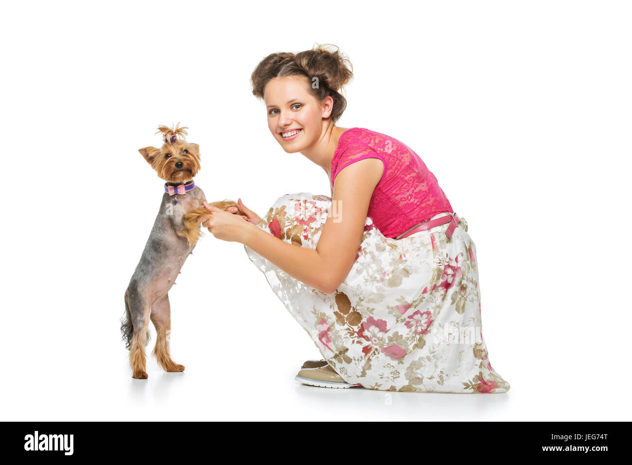 Girl with yorkie dog Stock Photo