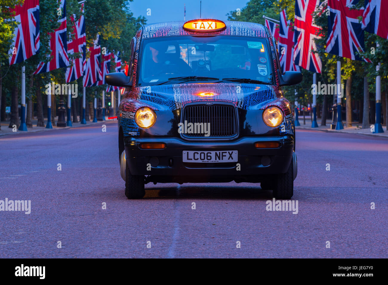 london taxi with union jacks Stock Photo