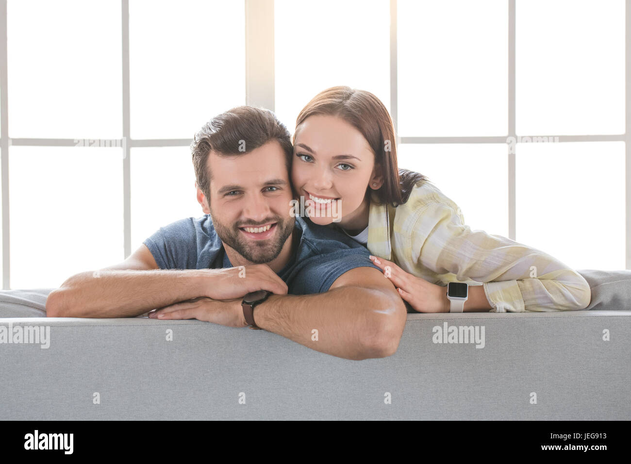 Young woman and man family couple indoors love Stock Photo - Alamy