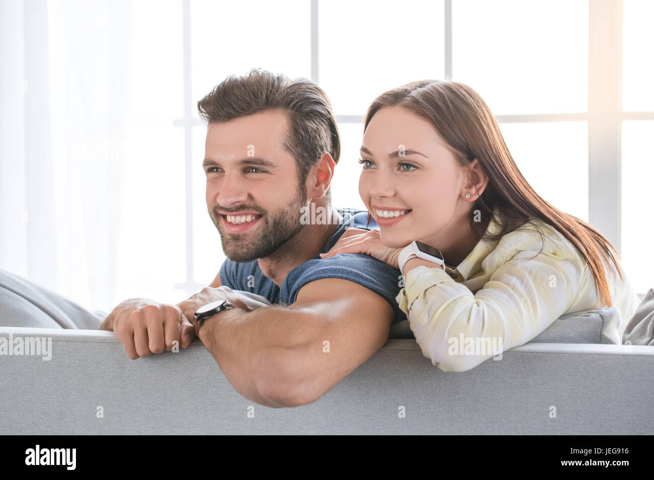 Young woman and man family couple indoors love Stock Photo - Alamy