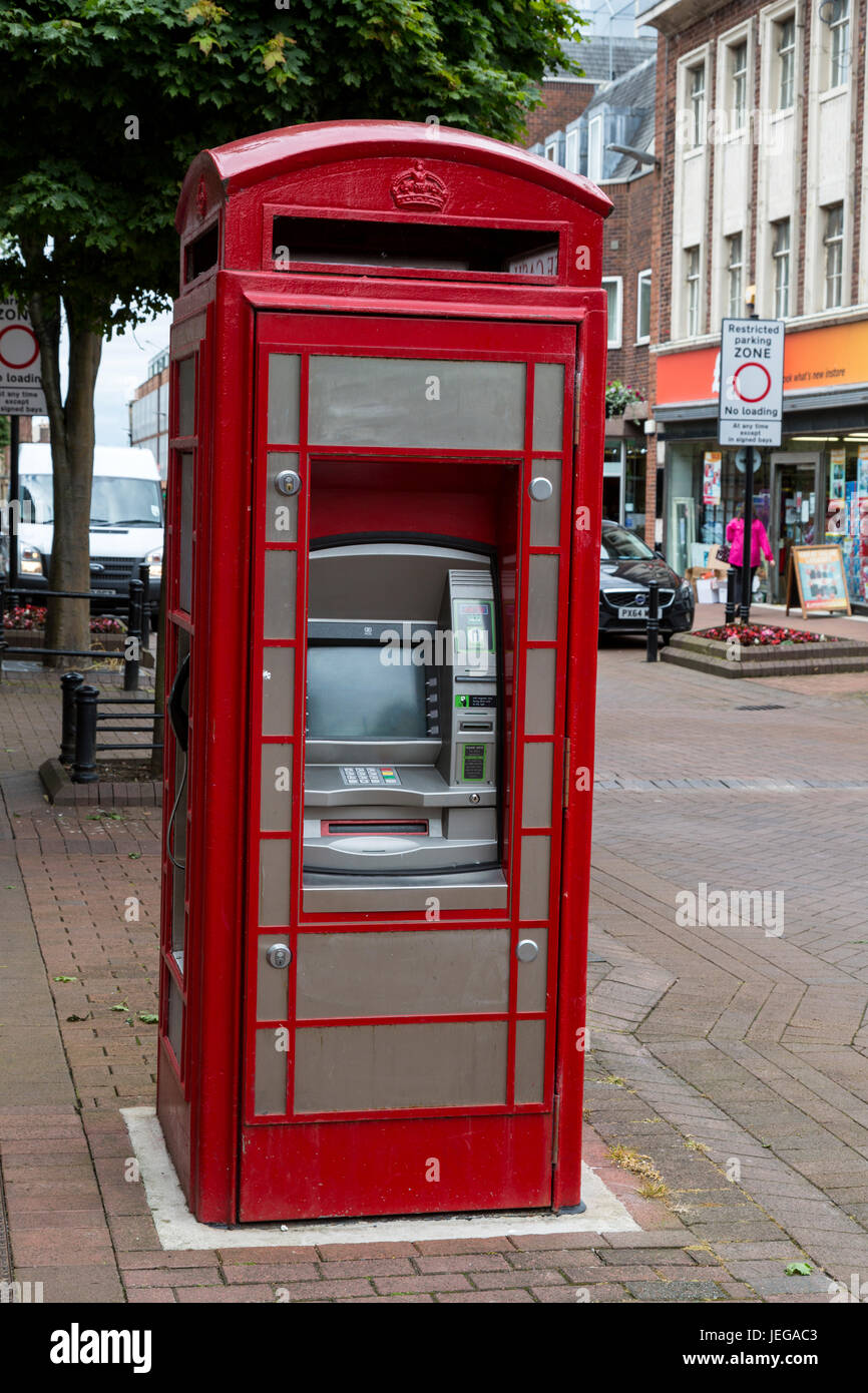 Carlisle, England, UK.  ATM Machine now Occupies an Old  Re-purposed British Telephone Booth. Stock Photo