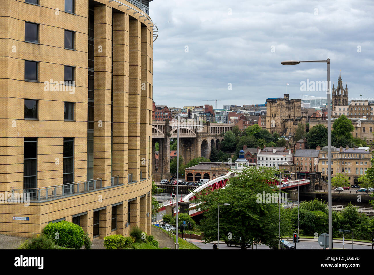 Newcastle-upon-Tyne, England, UK.  Hilton Hotel on Left, Castle Tower in Middle Distance, High Level Bridge between the two. Stock Photo