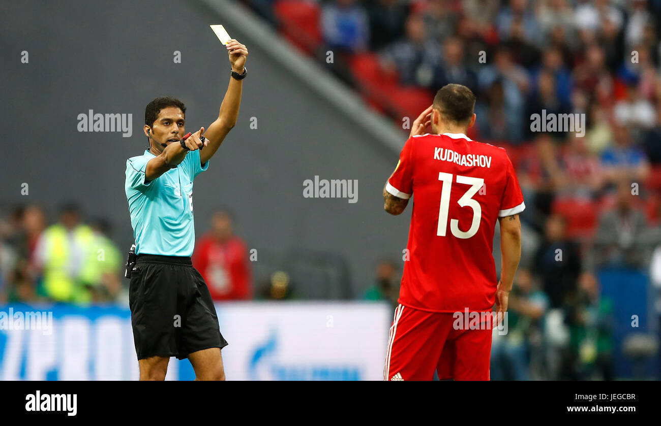 Kazan, Russia. 24th June, 2017. Referee Fahad al Mirdasi (KSA) shows yellow card for Fedor KUDRIASHOV from Russia during a match between Mexico and Russia valid for the third round of the 2017 Confederations Cup on Saturday (24) held at the Kazan Arena Stadium in Kazan, Russia. (Photo: Rodolfo Buhrer/La Imagem/Fotoarena) Stock Photo