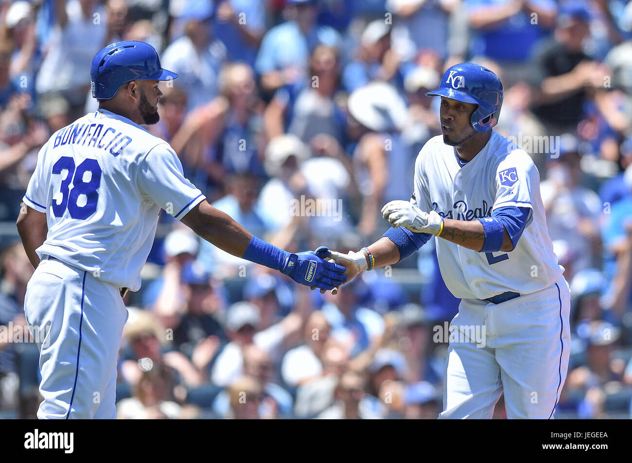 Kansas City, Missouri, USA. 24th June, 2017. Kansas City Royals shortstop Alcides Escobar (2) is congratulated by Kansas City Royals right fielder Jorge Bonifacio (38) after scoring a run in the bottom of the third inning during the Major League Baseball game between the Toronto Blue Jays and the Kansas City Royals at Kauffman Stadium in Kansas City, Missouri. The Royals won the game 3-2. Kendall Shaw/CSM/Alamy Live News Stock Photo