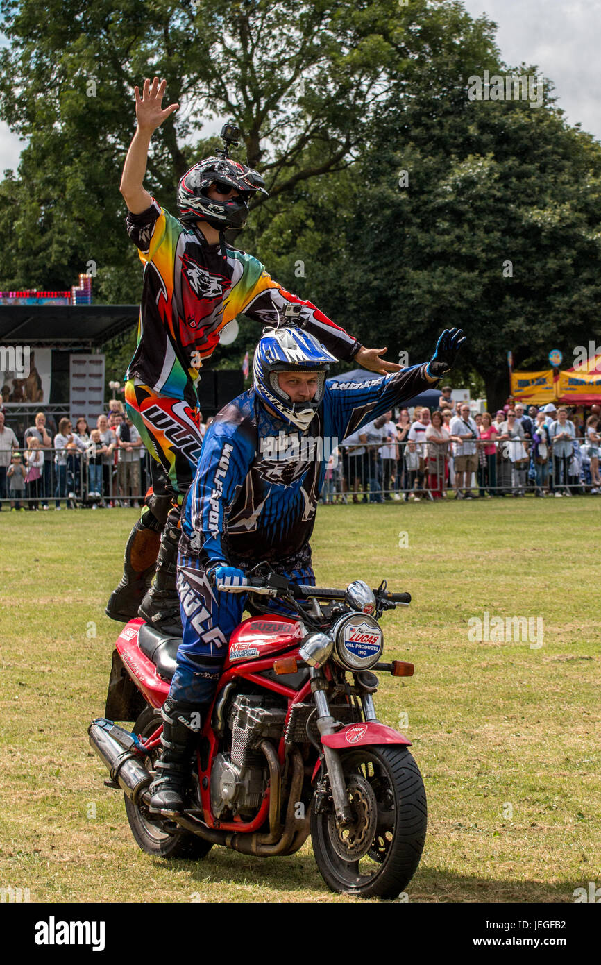 Two stunt bike riders balancing hi-res stock photography and images - Alamy