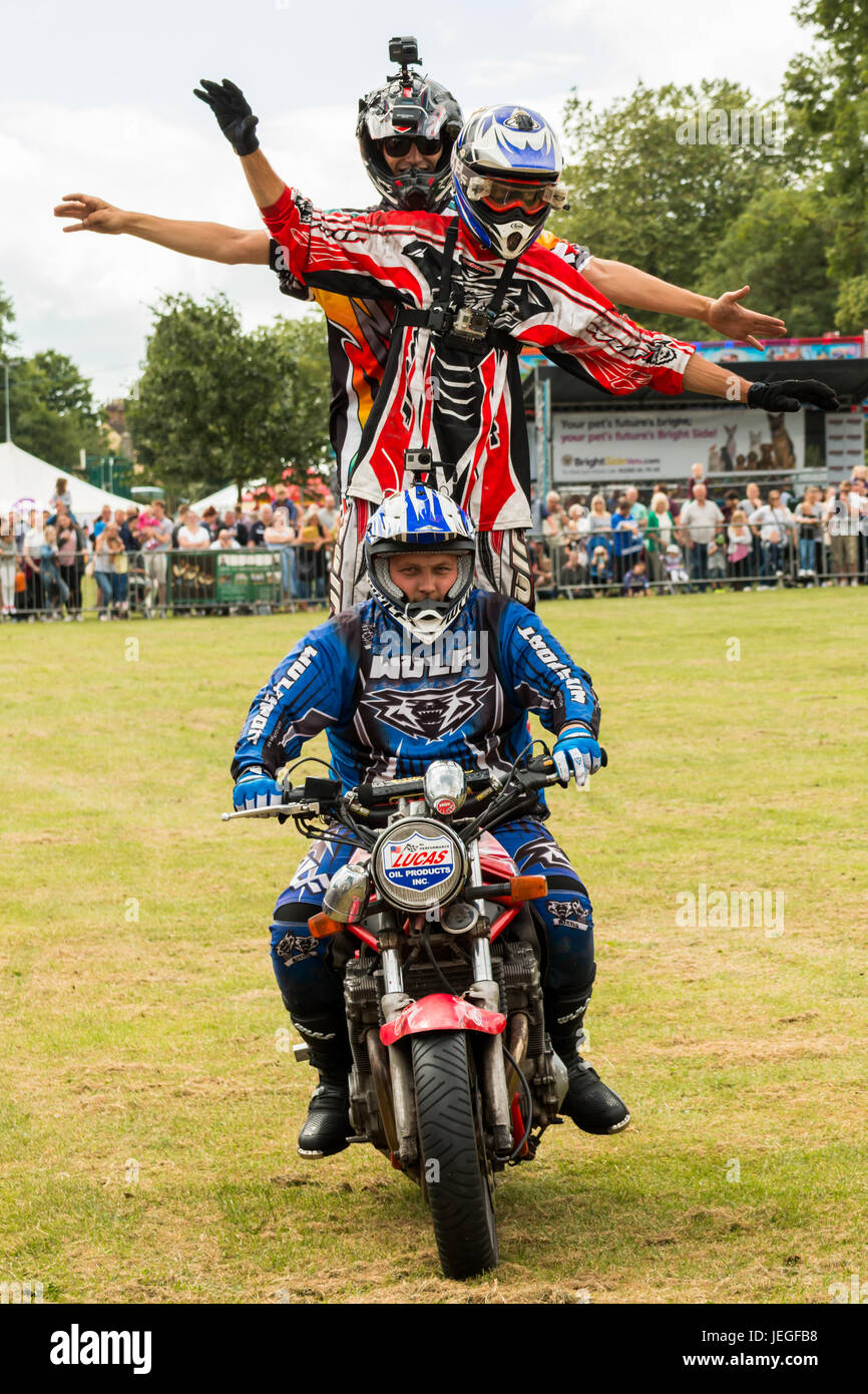 Two stunt bike riders balancing hi-res stock photography and images - Alamy