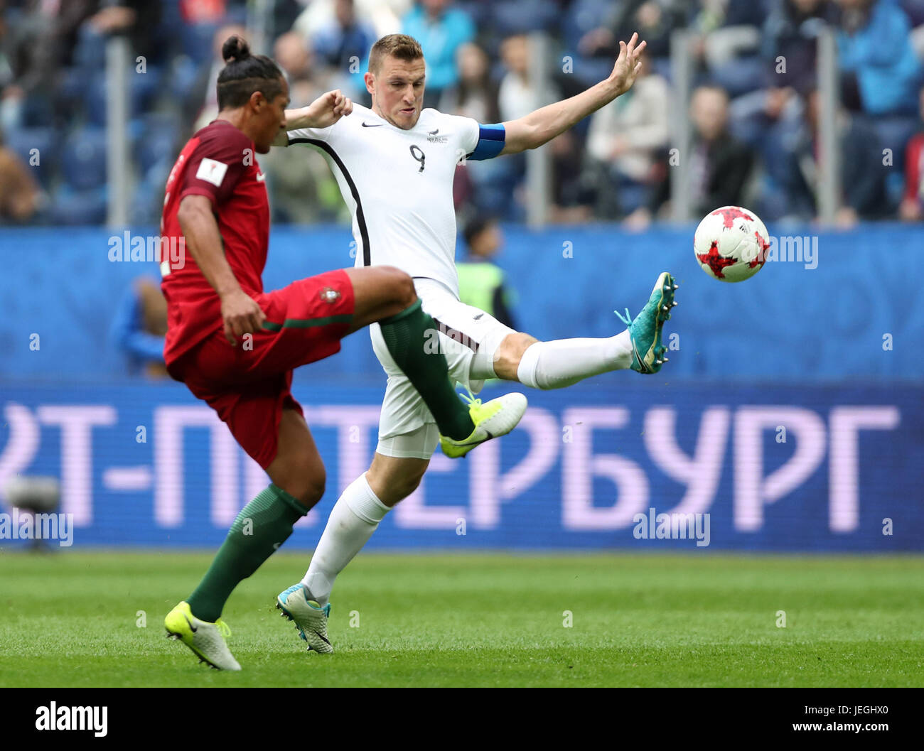St. Petersburg, Russia. 24th June, 2017. Chris Wood (R) of New Zealand vies with Bruno Alves of Portugal during the group A match between New Zealand and Portugal of the 2017 FIFA Confederations Cup in St. Petersburg, Russia, on June 24, 2017. Portugal won 4-0. Credit: Wu Zhuang/Xinhua/Alamy Live News Stock Photo