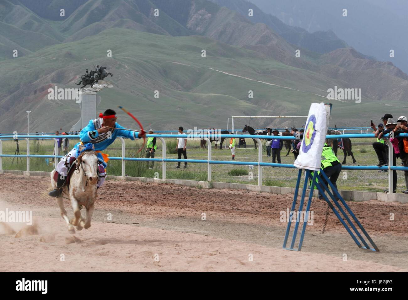 Zhangye, China's Gansu Province. 24th June, 2017. A competitor performs horseback archery during a horse racing event in Sunan County, northwest China's Gansu Province, June 24, 2017. Credit: Cheng Lin/Xinhua/Alamy Live News Stock Photo