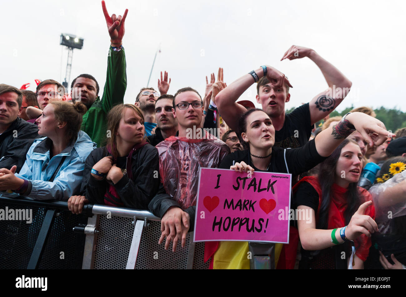 Festivalgoers cheer during the performance of the band 'Blink-182' on the second day of the Hurricane Festival in Scheessel, Germany, 24 June 2017. The 21st edition of the festival takes place between the 23 and 25 June. Photo: Sebastian Gollnow/dpa Stock Photo