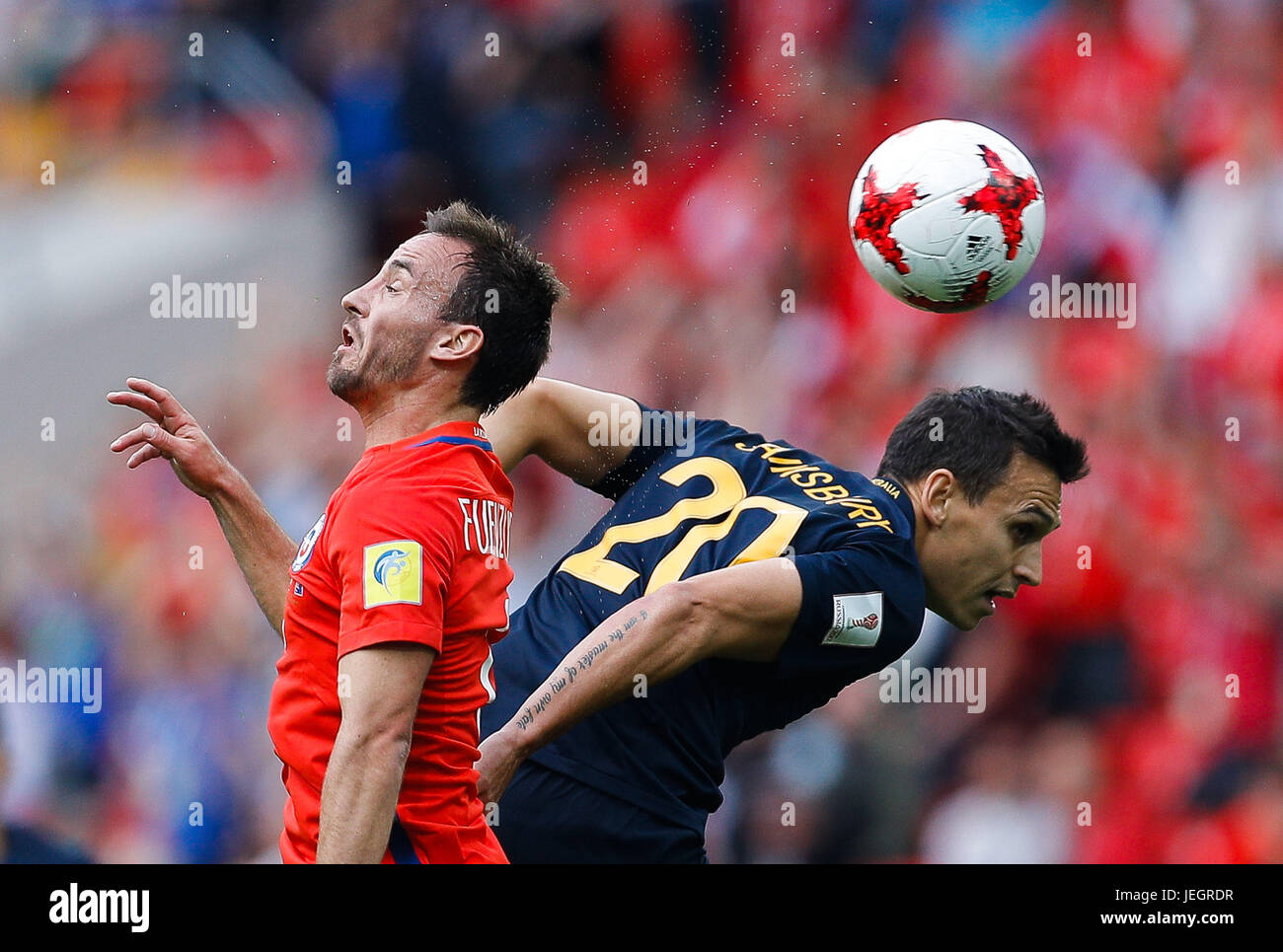 Moscow, Russia. 25th Jun, 2017. FUENZALIDA Jose of Chile plays the ball with SAINSBURY Trent of Australia during a match between Chile and Australia valid for the third round of the Confederations Cup 2017 on Sunday (25th), held at the Spartak Stadium (Otkrytie Arena) in Moscow, Russia. Credit: Foto Arena LTDA/Alamy Live News Credit: Foto Arena LTDA/Alamy Live News Credit: Foto Arena LTDA/Alamy Live News Credit: Foto Arena LTDA/Alamy Live News Stock Photo