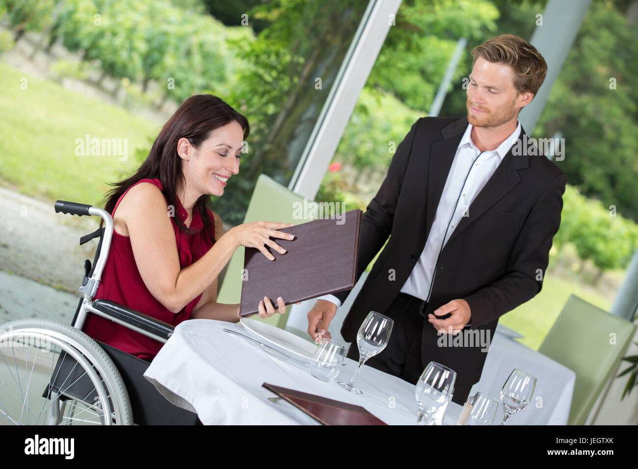 Wheelchair restaurant hires stock photography and images Alamy