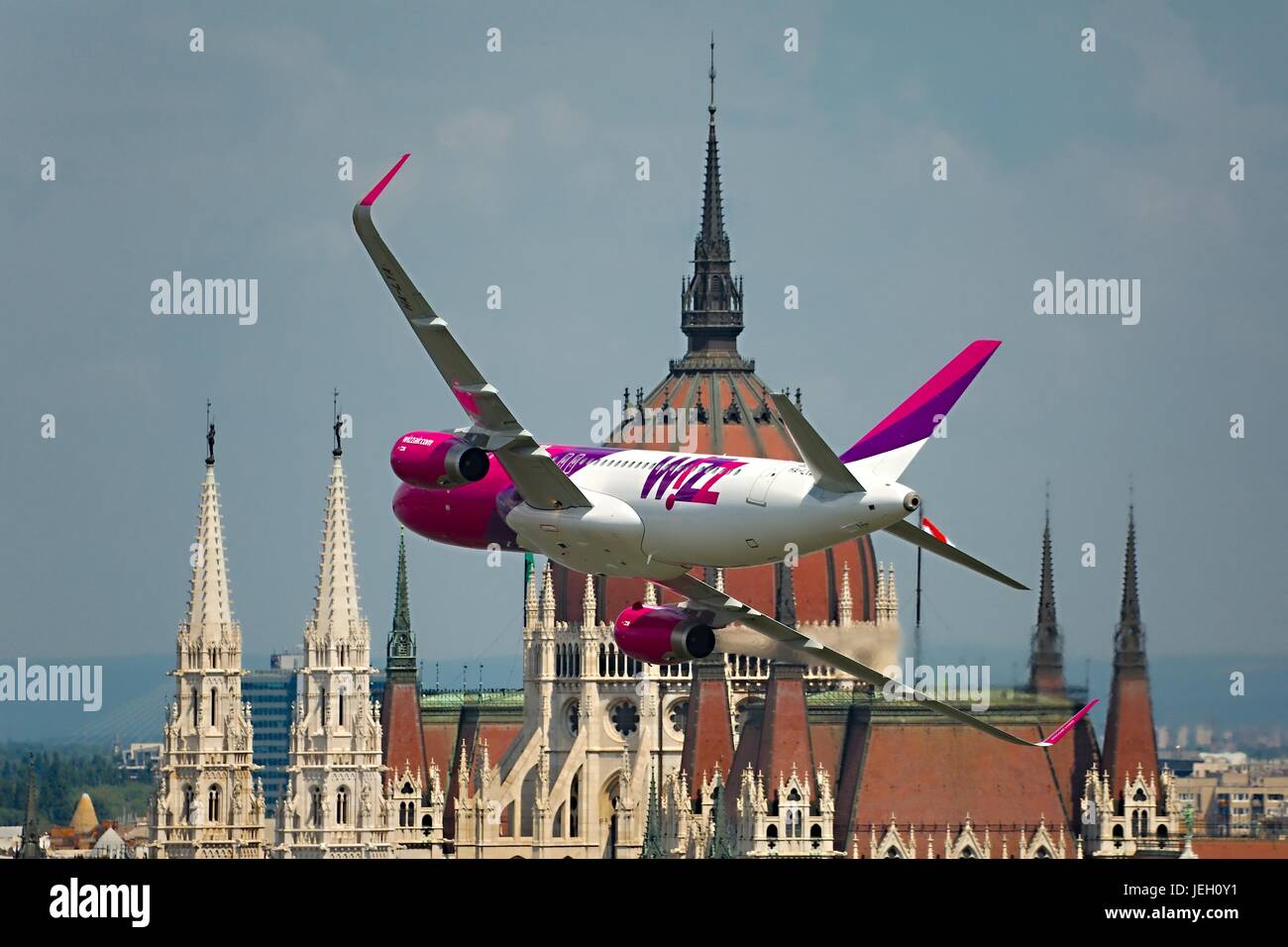 Airplane low pass in Budapest Stock Photo