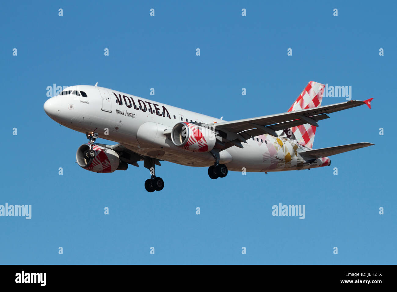 Civil aviation. Airbus A319 passenger jet of the Spanish low cost airline Volotea on approach. Budget airlines and cheap flights. Stock Photo