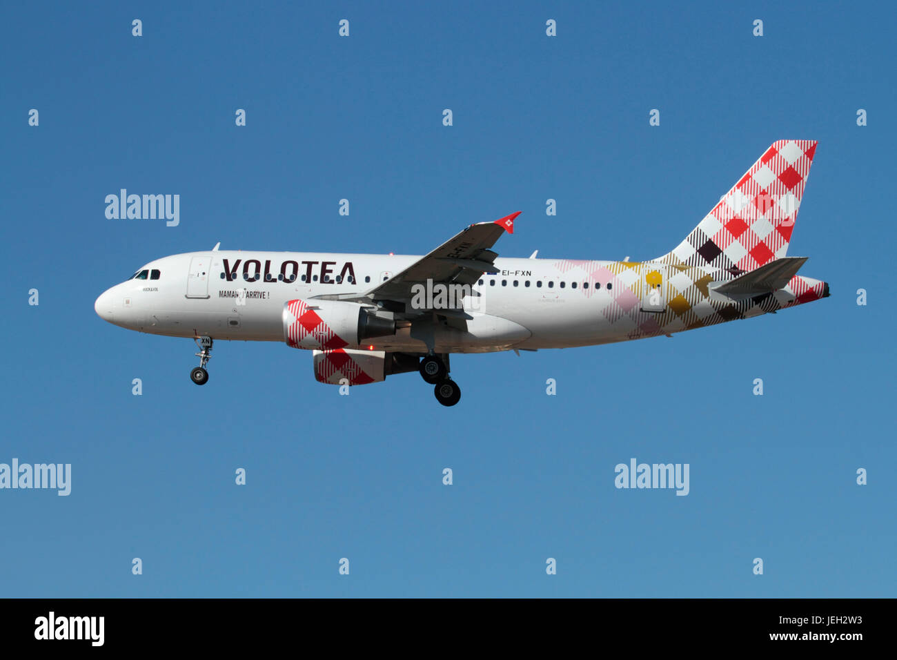 Commercial air travel. Airbus A319 airliner of the Spanish budget airline Volotea on approach Stock Photo