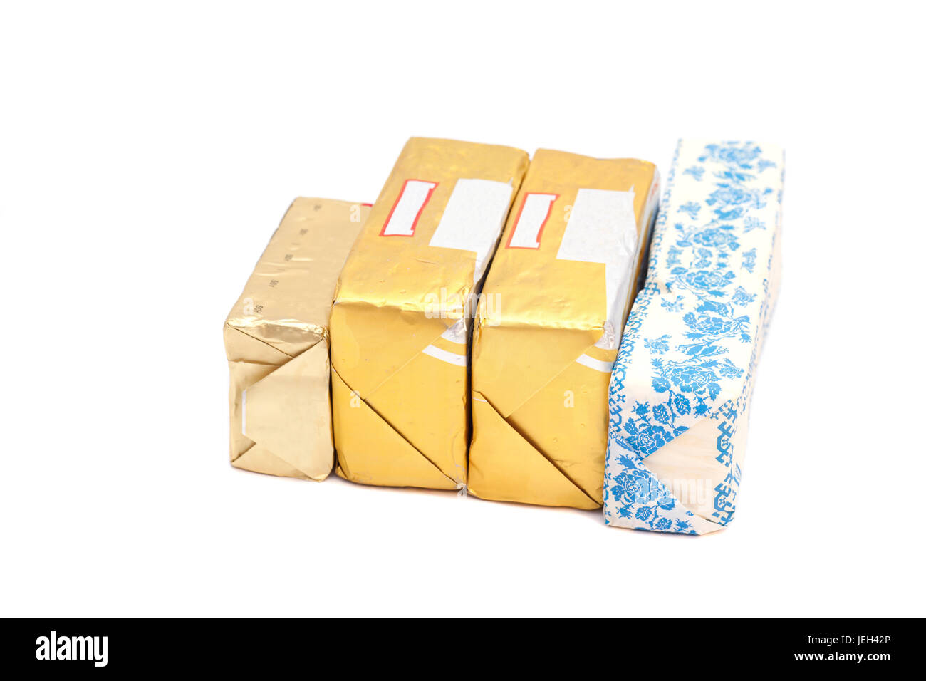 wrapped butter sticks Isolated on white background Stock Photo Alamy